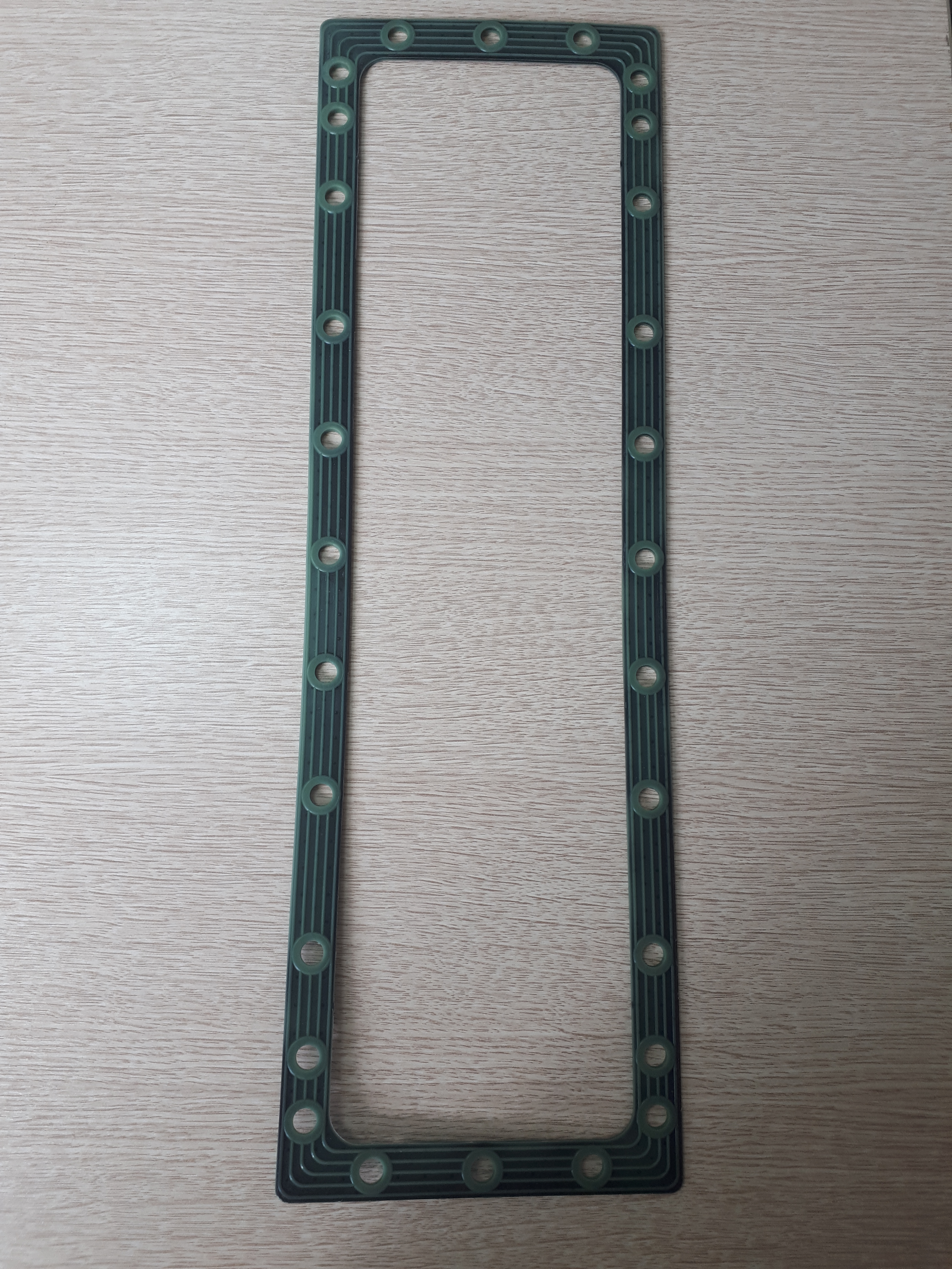 Прокладка бачка радиатора МТЗ-80/82 с РА каркасом зелёный