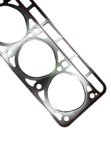 Прокладка головки блока 24 (3-угольные отверстия) усилена (обложена) металлом под газ БЦМ