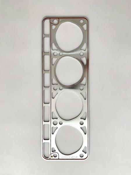 Прокладка головки блока 24 (3-угольные отверстия) усилена (обложена) металлом под газ БЦМ